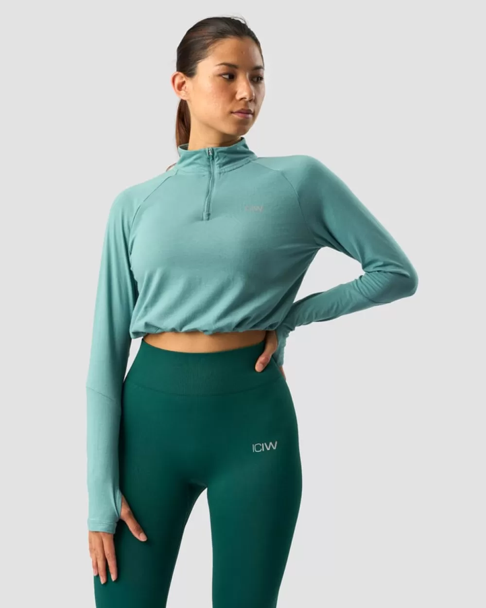 Women ICIW Define Cropped 1/4 Zip Adjustable Mineral Green