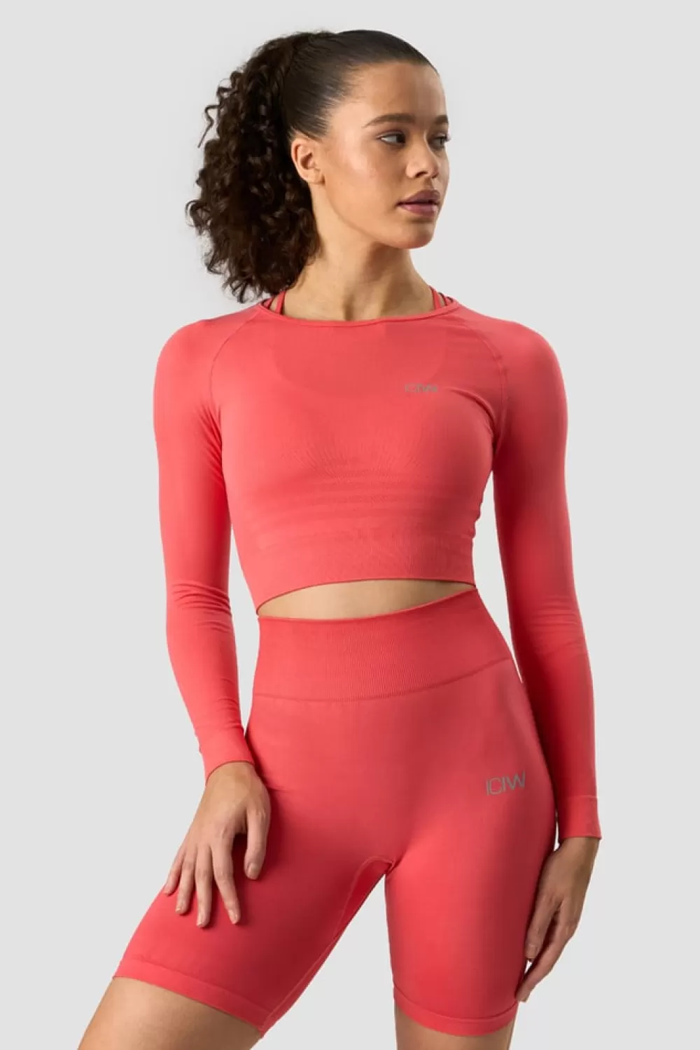 Women ICIW Define Seamless LS Crop Top Coral